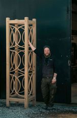 Designed by our founder and master joiner (pictured), the monumental Nodum 'knot' obelisk offers architectural intrigue and a splash of elegance - an exquisite feature in any setting. 