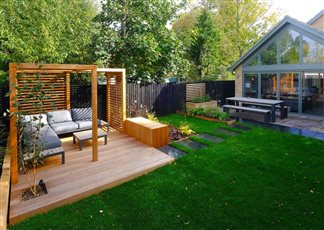 Grow Gardens Landscaping Pergola, Sofa Seating Area and Flower Beds