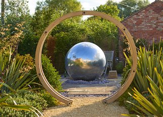 Water Feature chrome ball and moon gate